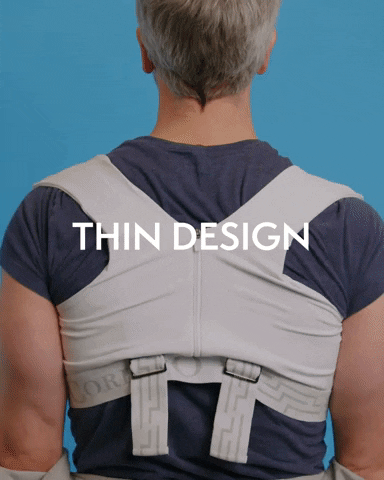 Man wearing CoreXO back and posture vest under his clothes seamlessly thanks to CoreXO's thin and comfortable materials that form to your skin for long term wear and muscle memory